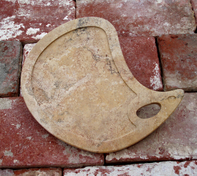 Tagliere "tavolozza" in travertino
