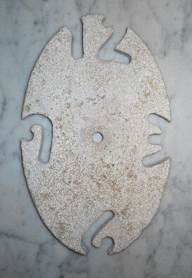 Orologio in pietra ovale sagomato